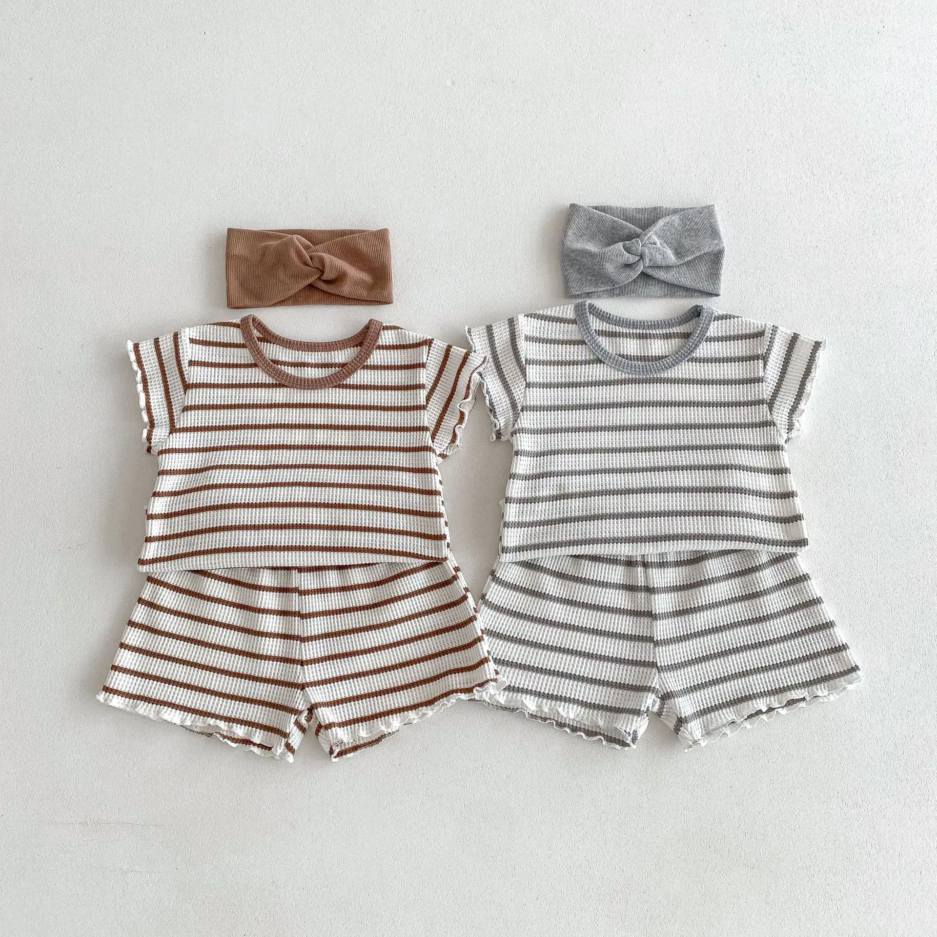 2024 Summer Boy Girl Children Ruffle Striped Short Sleev Tops + Shorts 2pcs Baby Loose Waffle T-shirt Set Kids Cotton Tees Set
2024 Summer Boy Girl Children Ruffle Striped Short Sleev Tops + Shorts 2pcs Baby Loose Waffle T-shirt Set Kids Cotton Tees Set