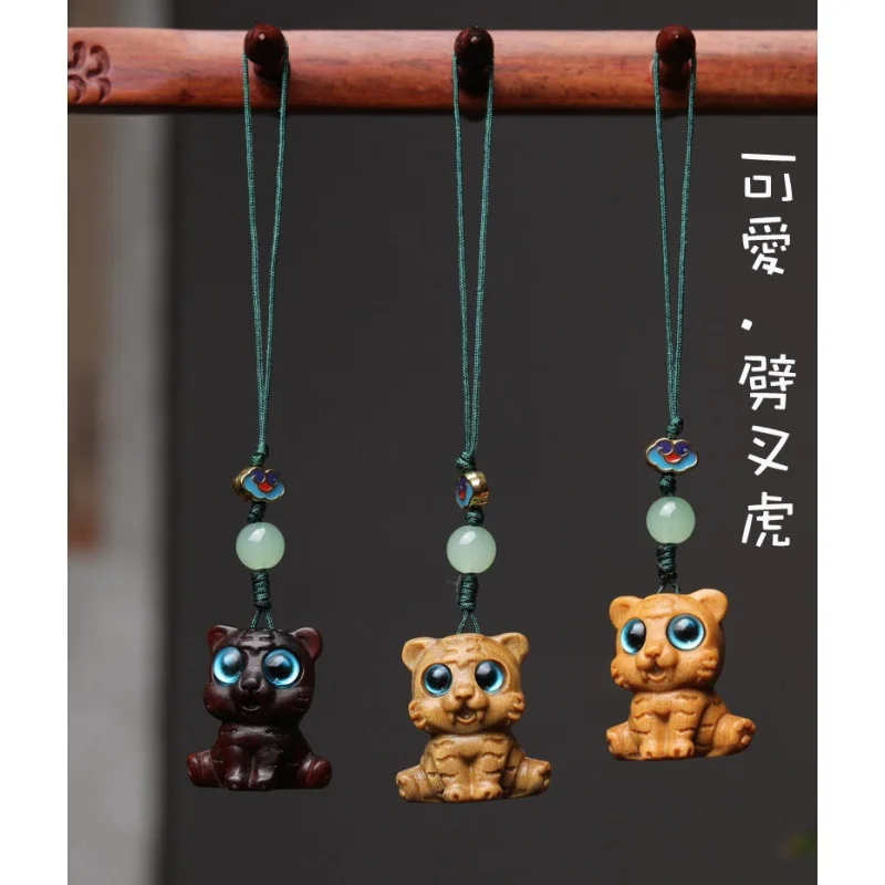 creative green sandalwood zodiac tiger cute tiger keychain mobile phone chain men and women play hand hanging ornaments
creative green sandalwood zodiac tiger cute tiger keychain mobile phone chain men and women play hand hanging ornaments