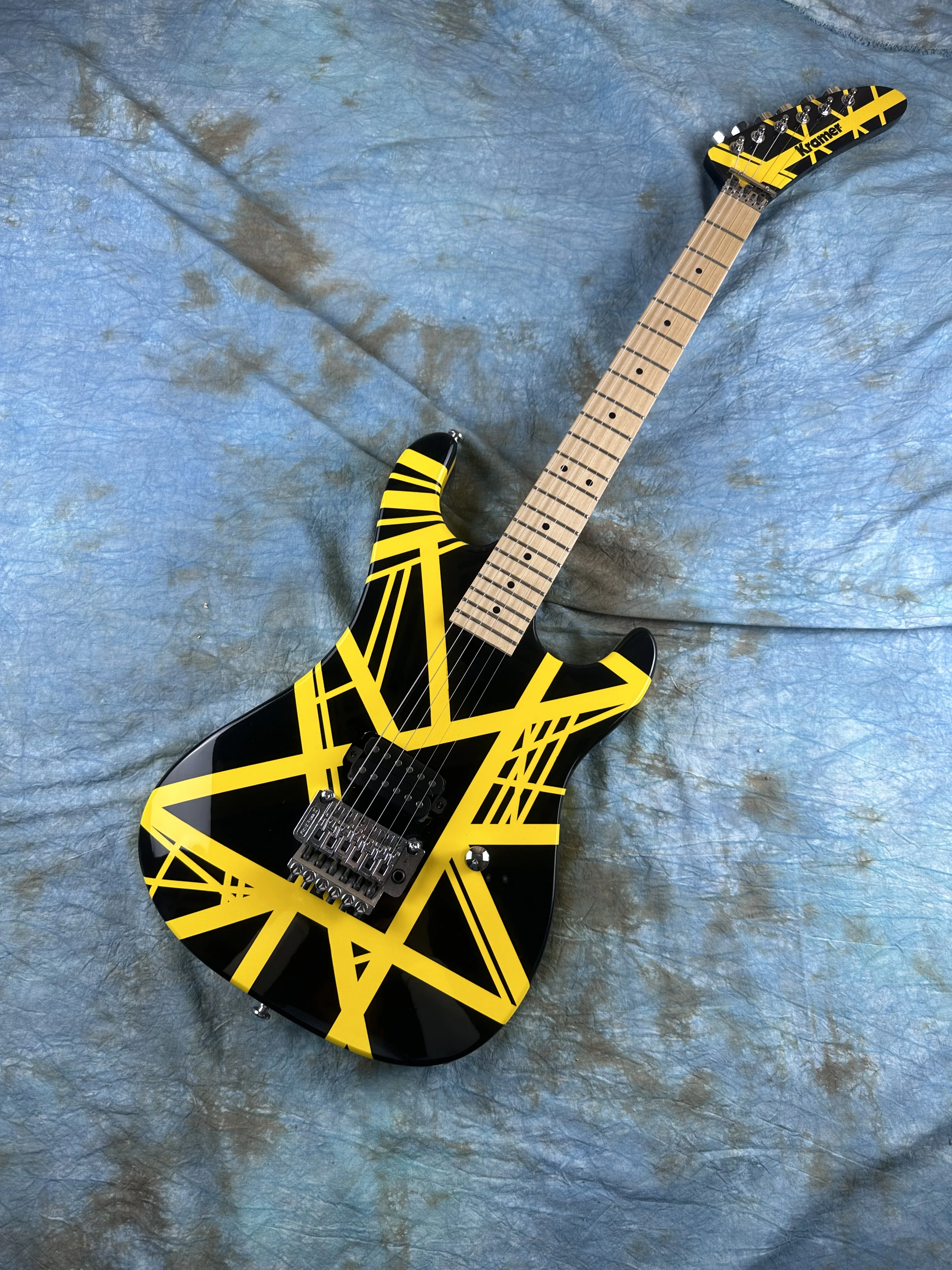 

5150 electric guitar, imported alder body, Canadian maple fingerboard, signed, classic yello and white stripes, lightning packag