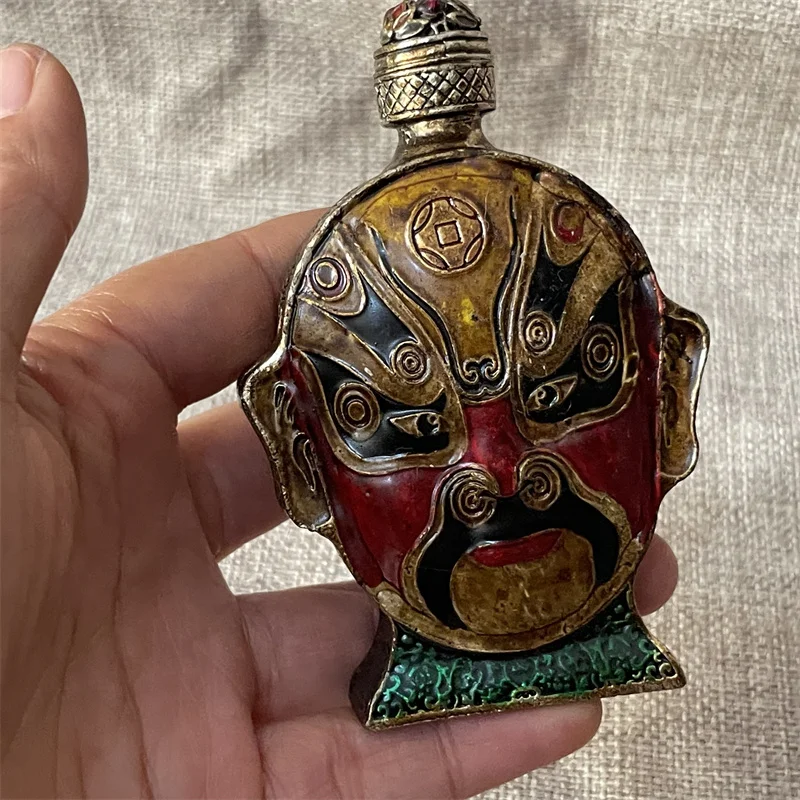 Pure copper inner painting old snuff bottle mask hand piece decorative features crafts double-sided snuff bottle.
Pure copper inner painting old snuff bottle mask hand piece decorative features crafts double-sided snuff bottle.