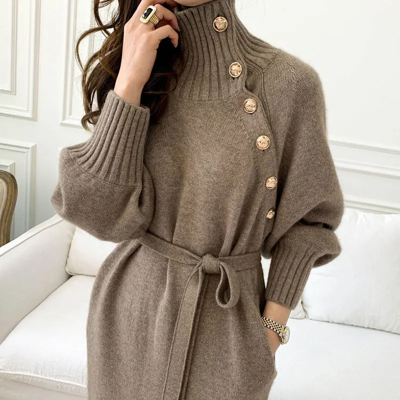 Chic winter retro potholes high neck oblique buckle knit skirt lace waist long long sleeve sweater dress.
Chic winter retro potholes high neck oblique buckle knit skirt lace waist long long sleeve sweater dress.