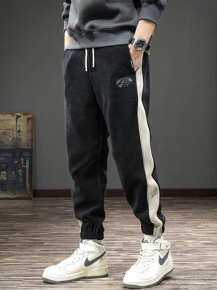 Модные спортивные брюки с боковыми полосками, мужские осенние повседневные Черные Мешковатые брюки с эластичным поясом и шнурком для бега
Модные спортивные брюки с боковыми полосками, мужские осенние повседневные Черные Мешковатые брюки с эластичным поясом и шнурком для бега