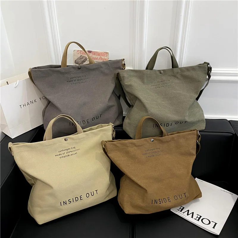 Winter new vintage Hong Kong style canvas female cross-border SennINS shoulder bag casual fashion simple handbag
Winter new vintage Hong Kong style canvas female cross-border SennINS shoulder bag casual fashion simple handbag