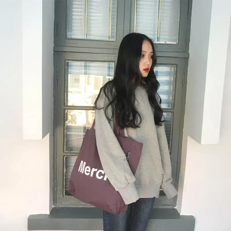 Girls Bag Canvas Tote Bag Letter Casual Solid Letter OPEN SOFT Shoulder Bag Handbag High-Capacity Sjopping Bag Simple Merci
Girls Bag Canvas Tote Bag Letter Casual Solid Letter OPEN SOFT Shoulder Bag Handbag High-Capacity Sjopping Bag Simple Merci