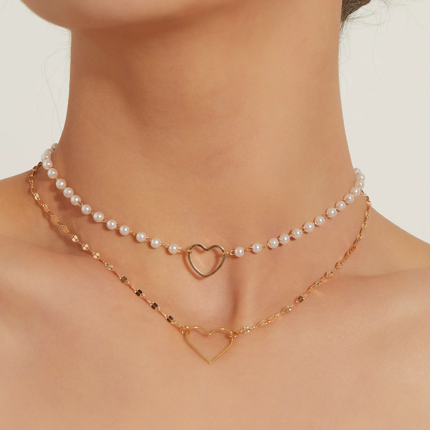 New Fashion Heart-shaped Pendant Trend Women's Necklace Double Layer White Pearl Temperament Is Popular N1331
New Fashion Heart-shaped Pendant Trend Women's Necklace Double Layer White Pearl Temperament Is Popular N1331
