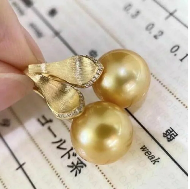 Gorgeous AAAA 10-11mm Natural South China Sea Round Gold Pearl Earrings 925s
Gorgeous AAAA 10-11mm Natural South China Sea Round Gold Pearl Earrings 925s