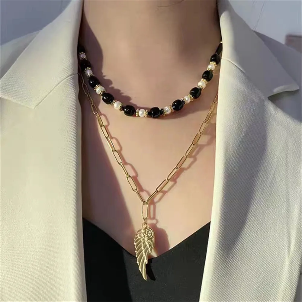

Винтажное женское ожерелье из натурального жемчуга, оригинальное нишевое дизайнерское роскошное модное ювелирное изделие из черного камня, подвеска с перьями, цепочка до ключицы
