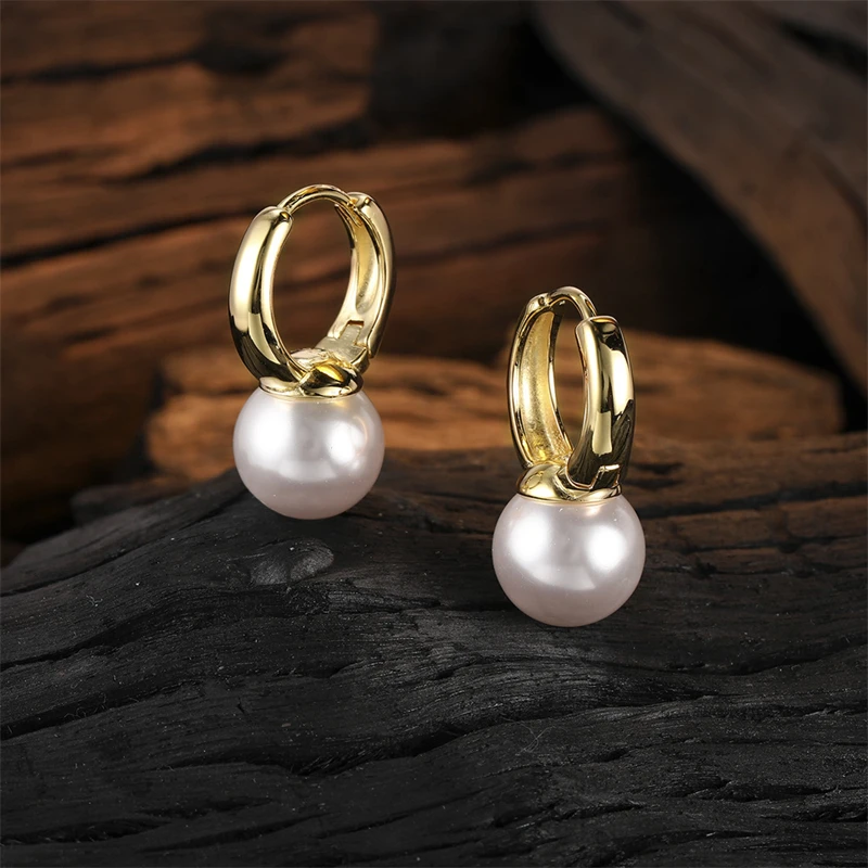 Серьги-кольца женские из серебра 925 пробы с кристаллами и жемчугом
Серьги-кольца женские из серебра 925 пробы с кристаллами и жемчугом