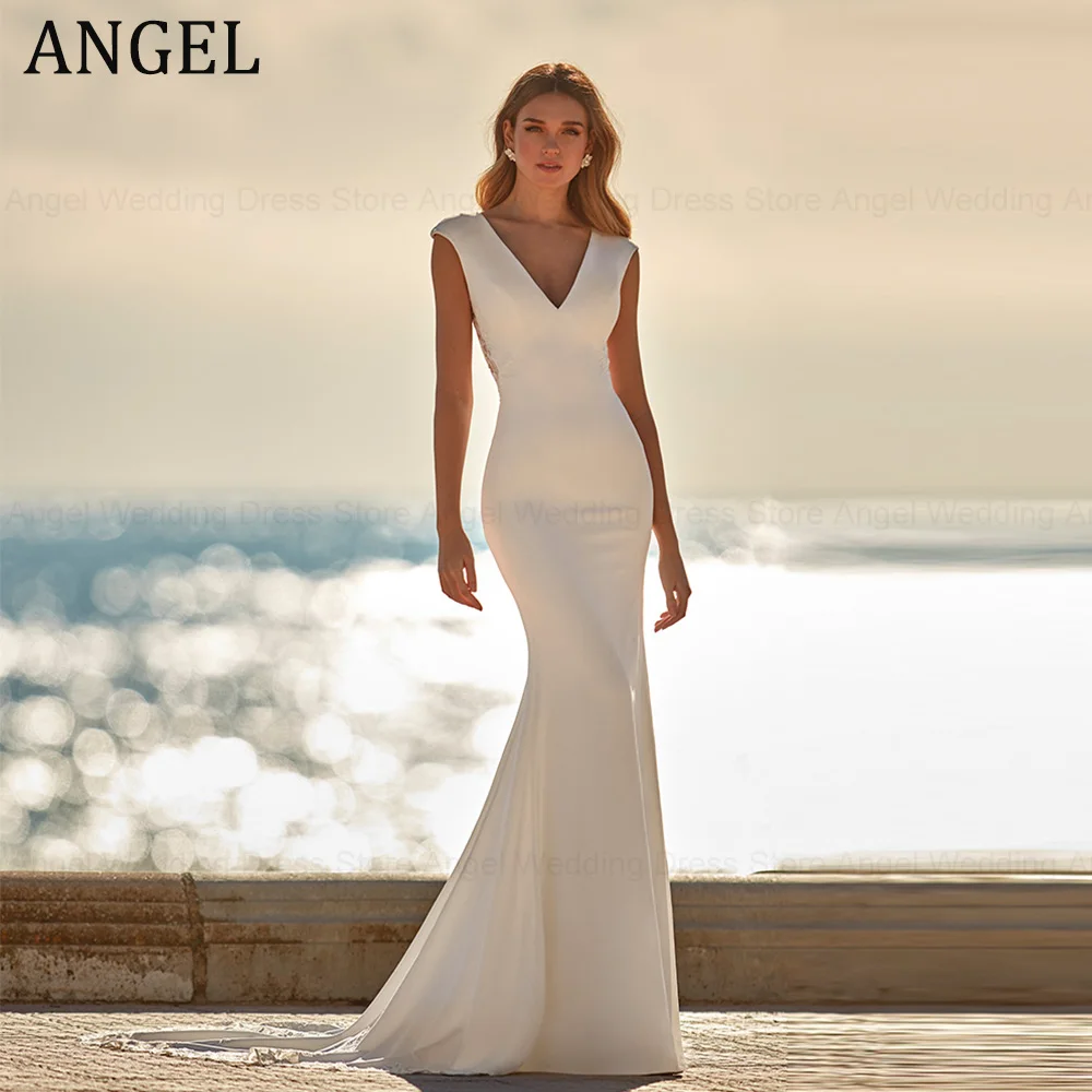 ANGEL V-Neck Mermaid Weddng Dress Cap Sleeve Spandex Lace Appliques Beach Bride Gown Backless Button Vestido De Novia
ANGEL V-Neck Mermaid Weddng Dress Cap Sleeve Spandex Lace Appliques Beach Bride Gown Backless Button Vestido De Novia