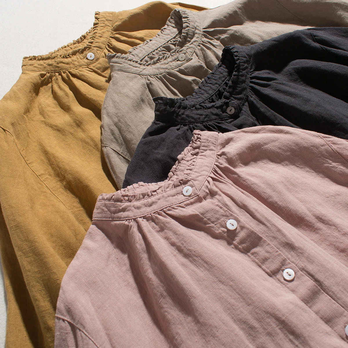 Japanese single sand wash pure linen advanced matte texture literary and artistic forest tree ear edge stand collar long sleeve
Japanese single sand wash pure linen advanced matte texture literary and artistic forest tree ear edge stand collar long sleeve