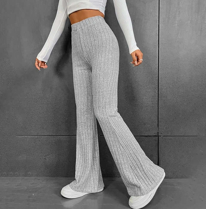 

Модные брюки для женщин в стиле пэчворк трикотажные в полоску с высокой талией тонкие однотонные ребристые расклешенные брюки Свободная трикотажная одежда женские брюки