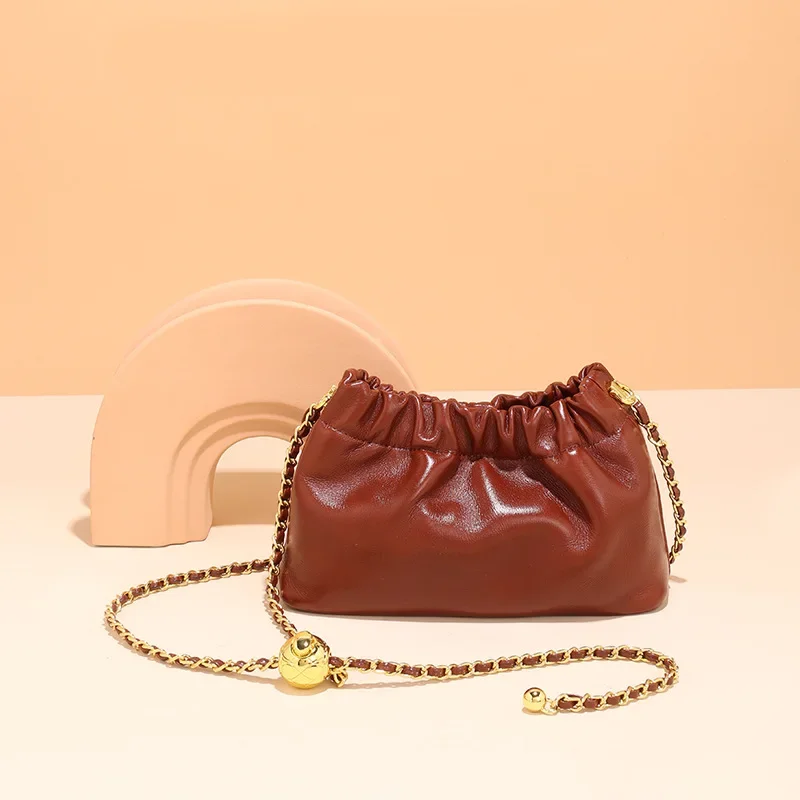 The First Layer of Cowhide High-end Small Gold Ball Chain Leather Pleated Cloud Bag Niche Crossbody Bags Women's Versatile Hasp
The First Layer of Cowhide High-end Small Gold Ball Chain Leather Pleated Cloud Bag Niche Crossbody Bags Women's Versatile Hasp