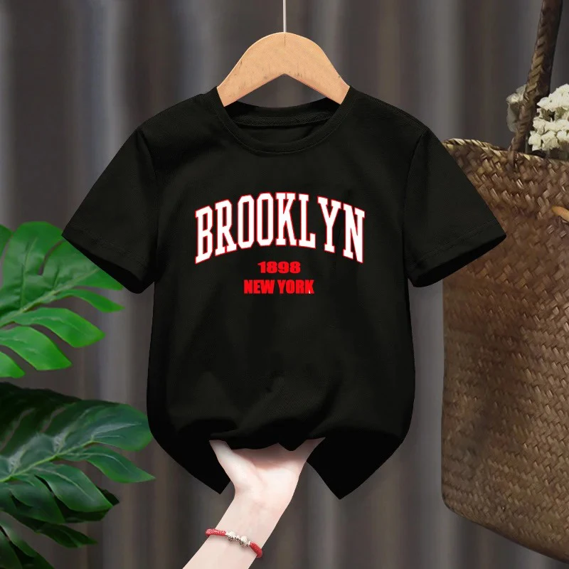 

Brooklyn 1898 New York Boy Girl T-shirts Kid Children Letter Clothes Baby Black Harajuku Kawaii Tops Gift Present ,Drop Ship