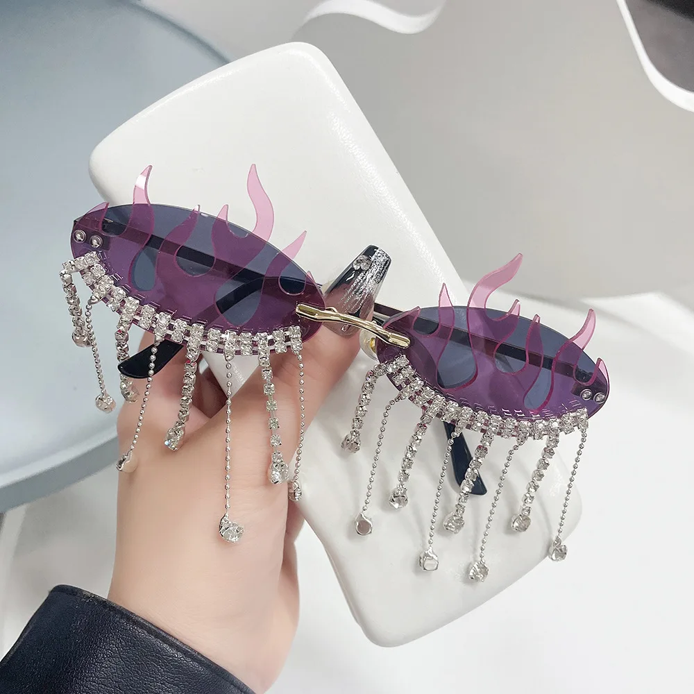 

Diamonds Fire Flame Sunglasses Women Luxury Rhinestone Fashion Rimless Eyewear Female Wave Shades Shiny UV400 Sun Glasses Men