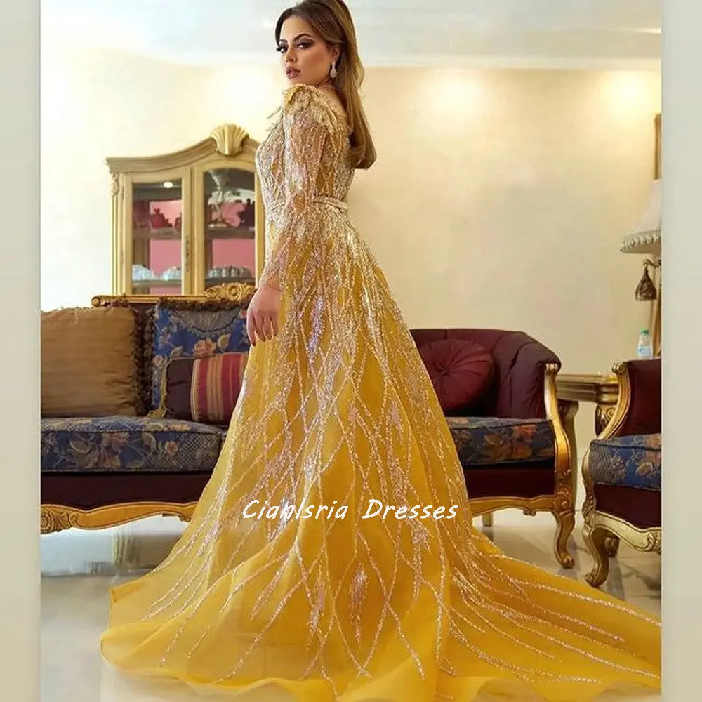 Gold Geometry Crystal Dubai Mermaid Evening Dress Detachable Train Feathers Long Sleeve Saudi Arabic Formal Party Gown
Gold Geometry Crystal Dubai Mermaid Evening Dress Detachable Train Feathers Long Sleeve Saudi Arabic Formal Party Gown
