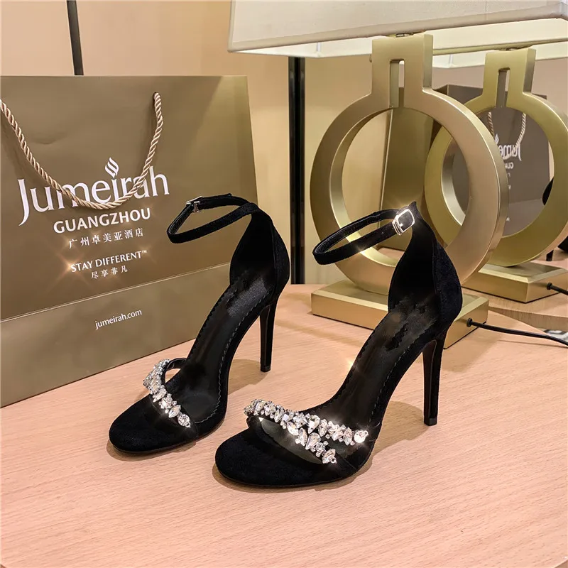 New all-match black rhinestone shoes a word buckle high-heeled sandals 10CM stiletto sexy women's shoes
New all-match black rhinestone shoes a word buckle high-heeled sandals 10CM stiletto sexy women's shoes