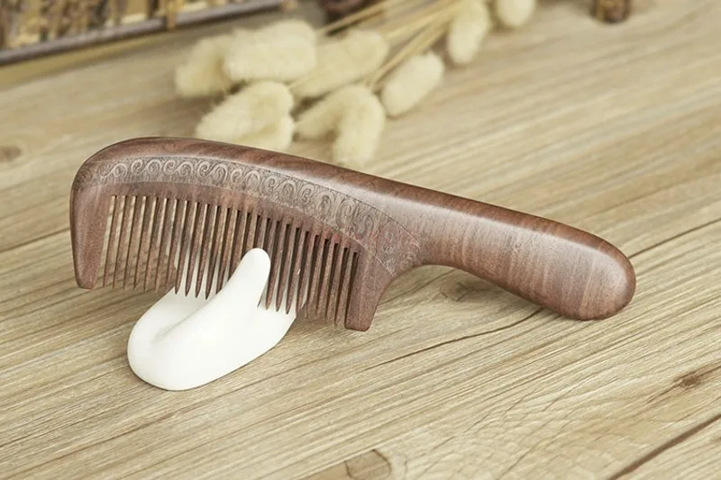 Double sided carved handle wooden comb with open tooth root hair care natural peach wood comb
Double sided carved handle wooden comb with open tooth root hair care natural peach wood comb