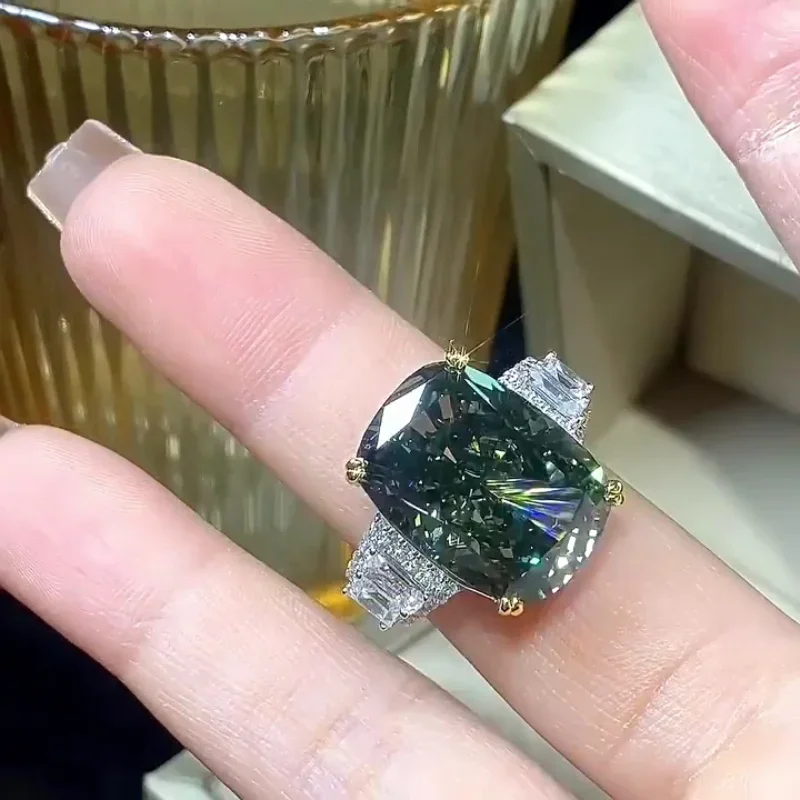 Огромное кольцо с бриллиантом 10ct с зеленым муассанитом, 100% реальное серебро 925 пробы, Женская Свадебная лента, бриллиантовое ювелирное изделие для помолвки
Огромное кольцо с бриллиантом 10ct с зеленым муассанитом, 100% реальное серебро 925 пробы, Женская Свадебная лента, бриллиантовое ювелирное изделие для помолвки