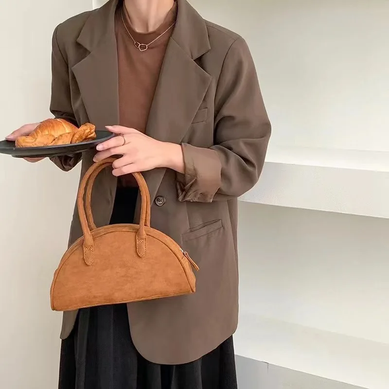 

Korean niche design new retro frosted suede handbag large-capacity bowling handbag casual fashion Boston shoulder crossbody bag