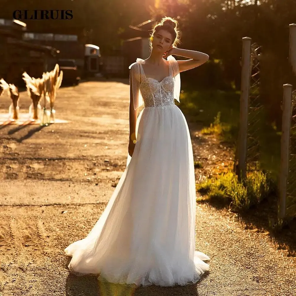 

2022 Ivory A-Line Dots Net Wedding Dress Sequined Appliques Lace Bridal Gowns Adjustable Straps Sexy Brides Dresses