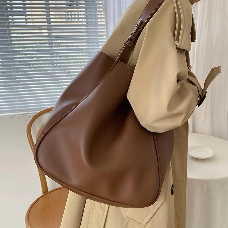 Large Capacity Women Handbags Vintage Pu Leather Shoulder Bag Solid Color Totes Female Simple Designer Shopping and Travel Bags
Large Capacity Women Handbags Vintage Pu Leather Shoulder Bag Solid Color Totes Female Simple Designer Shopping and Travel Bags