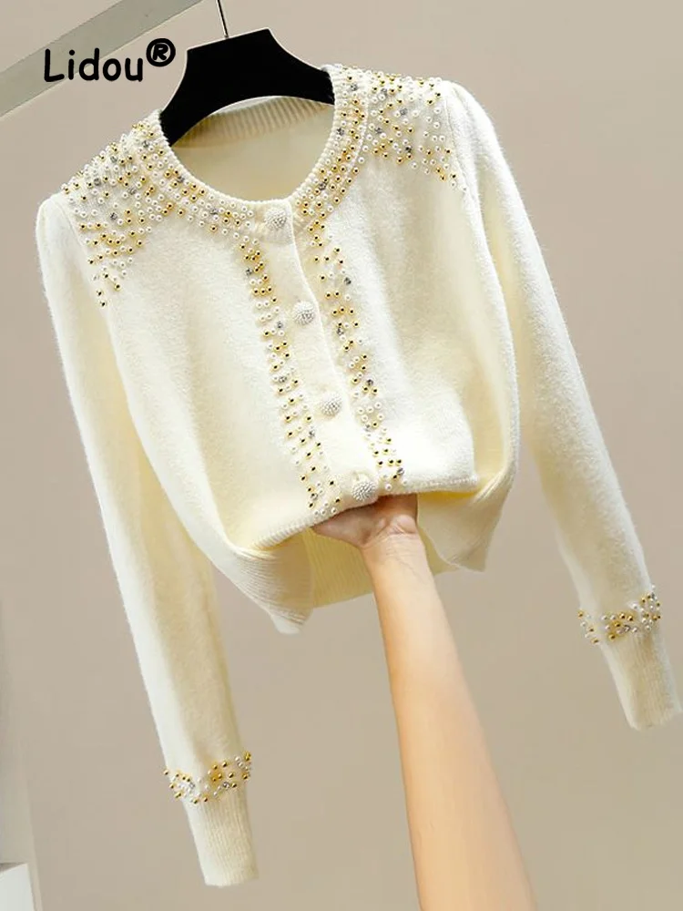 Autumn Colour Nail Bead Diamonds Single-breasted Sweaters Women Classic Long Sleeve V-neck Temperament All-match Top 2022
Autumn Colour Nail Bead Diamonds Single-breasted Sweaters Women Classic Long Sleeve V-neck Temperament All-match Top 2022