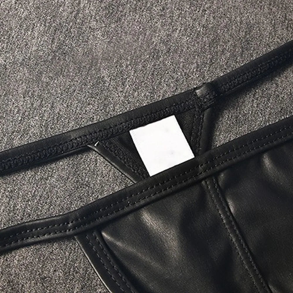 Men Faux Leather Thong Underwear Sexy Low Waist G-String Briefs Bugle Pouch Panties Bikini Bright Imitation Lingerie T-Back
Men Faux Leather Thong Underwear Sexy Low Waist G-String Briefs Bugle Pouch Panties Bikini Bright Imitation Lingerie T-Back