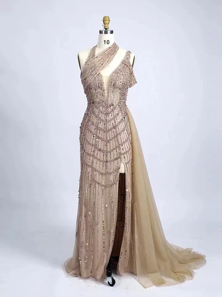 Dubai Luxury Beaded Lilac Mermaid Halter Evening Dress with Overskirt Side Slit Wedding Party Dress
Dubai Luxury Beaded Lilac Mermaid Halter Evening Dress with Overskirt Side Slit Wedding Party Dress