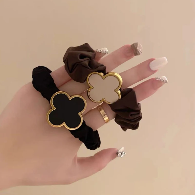 

Metal Four-Leaf Clover Large Intestine Hair Ring Female Ins Korean Tie Ponytail Advanced Sense Simple French Retro Headband