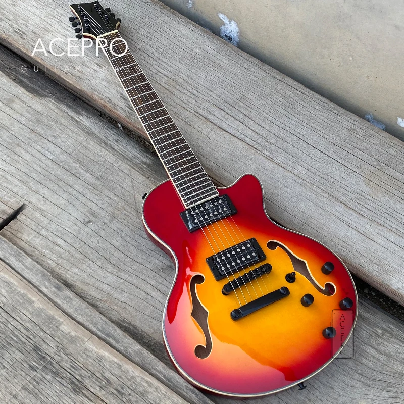Grote 7 String F-отверстий для электрогитары, полупустотелый корпус цвета вишни Sunburst, верх из клена пламени, черная фурнитура, блокировочные тюнеры
Grote 7 String F-отверстий для электрогитары, полупустотелый корпус цвета вишни Sunburst, верх из клена пламени, черная фурнитура, блокировочные тюнеры