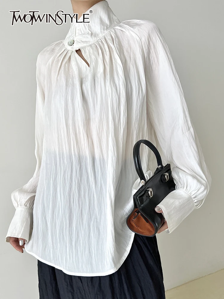 TWOTWINSTYLE Pullover Hollow Out Shirt For Women Stand Collar Puff Sleeve Patchwork Button Minimalist Blouse Female Clothing New
TWOTWINSTYLE Pullover Hollow Out Shirt For Women Stand Collar Puff Sleeve Patchwork Button Minimalist Blouse Female Clothing New