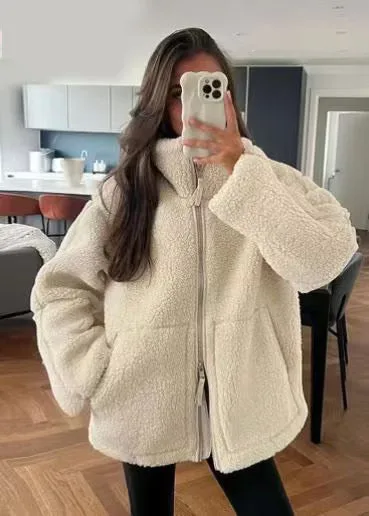 European and American style autumn and winter new style temperament loose standing collar zippered woolen jacket
European and American style autumn and winter new style temperament loose standing collar zippered woolen jacket