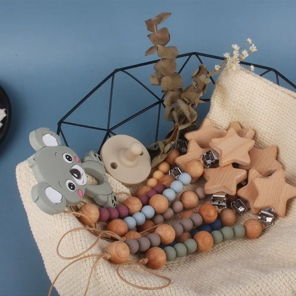Wooden Beads Beech Wood Food Grade Heart Clip Silicone Nipple Holder Pacifier Clips Chains Baby Pacifier Chain Molar Chain
Wooden Beads Beech Wood Food Grade Heart Clip Silicone Nipple Holder Pacifier Clips Chains Baby Pacifier Chain Molar Chain