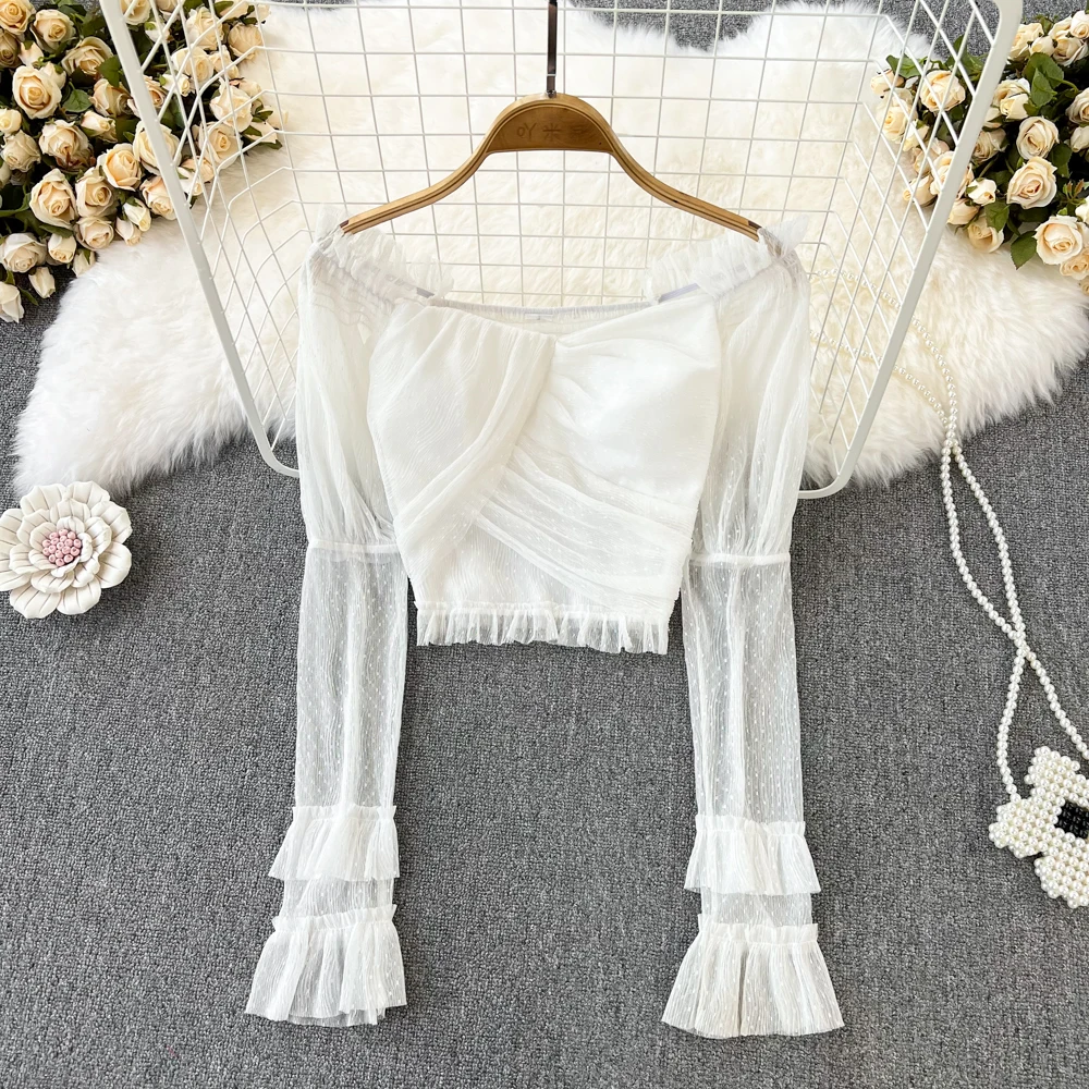 Korean Version of the Sexy Spice Girl One Line Shoulder Off-shoulder Flared Sleeve Mesh Gauze Slim Solid Color Short Top
Korean Version of the Sexy Spice Girl One Line Shoulder Off-shoulder Flared Sleeve Mesh Gauze Slim Solid Color Short Top