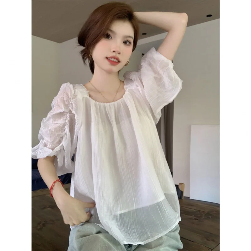 Off shoulder short sleeved two piece shirt with pleated square collar for a slimming top
Off shoulder short sleeved two piece shirt with pleated square collar for a slimming top