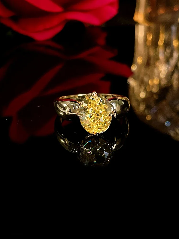 

A New Egg Shaped Yellow Diamond 925 Silver Ring Set with High Carbon Diamonds for Daily Niche Design
