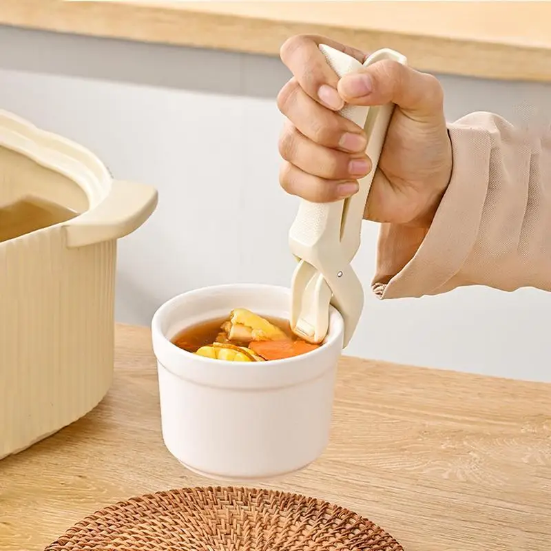 Hot Bowl Gripper Clip Foldable Hot Dish Clamp Microwave Oven Tray Non Slip Pan Gripper Heat Proof Bowl Clamp Kitchen Accessories
Hot Bowl Gripper Clip Foldable Hot Dish Clamp Microwave Oven Tray Non Slip Pan Gripper Heat Proof Bowl Clamp Kitchen Accessories