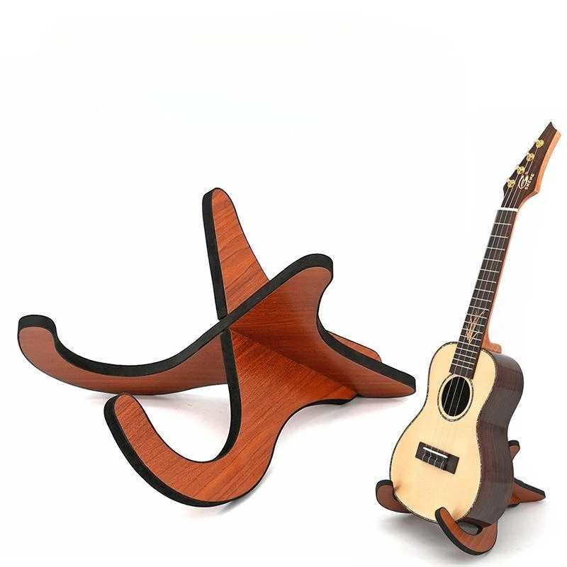 New Portable Ukulele Holder Stand Guitar Ukulele Stand Wooden For Guitarra Accessories Stand Musical Strings Instrument Part
New Portable Ukulele Holder Stand Guitar Ukulele Stand Wooden For Guitarra Accessories Stand Musical Strings Instrument Part