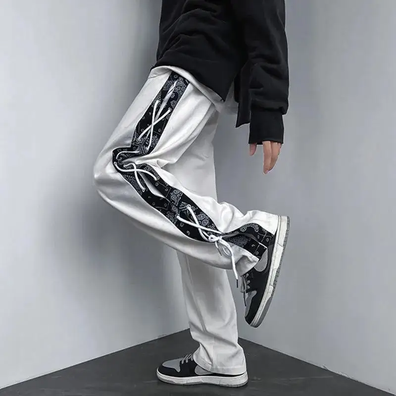 High Street Patchwork Cross Wide Leg Pants Men Loose Printing Waist Drawstring Streetwear Fashion All-match Trousers Men
High Street Patchwork Cross Wide Leg Pants Men Loose Printing Waist Drawstring Streetwear Fashion All-match Trousers Men