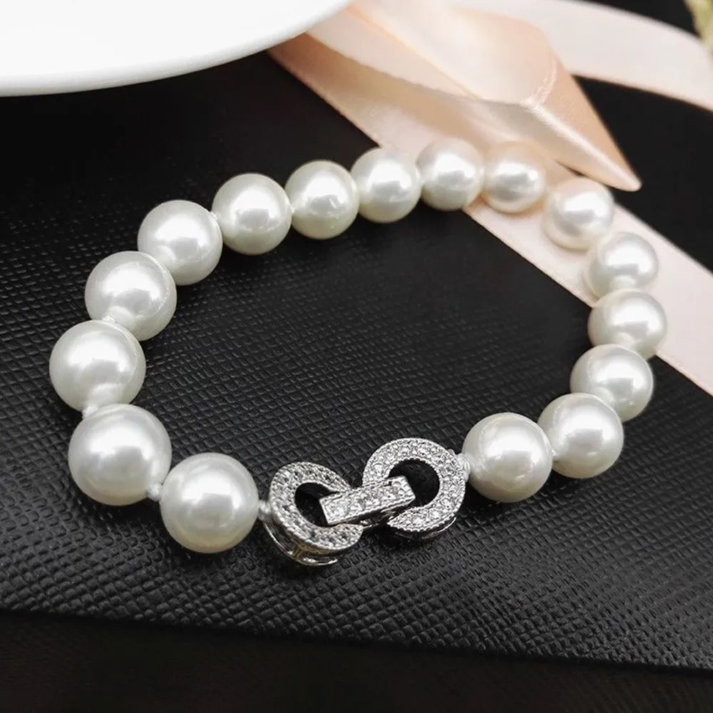 Handmade knotted bracelet natural 10mm white shell pearl 20cm for women jewelry fashion gift
Handmade knotted bracelet natural 10mm white shell pearl 20cm for women jewelry fashion gift