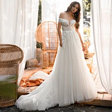 RANMO Gorgeous Lace Wedding Dress A Line Off the Shoulder Church Bridal Dress Applique Pearls Backless Sparkly Bridal Gown
RANMO Gorgeous Lace Wedding Dress A Line Off the Shoulder Church Bridal Dress Applique Pearls Backless Sparkly Bridal Gown