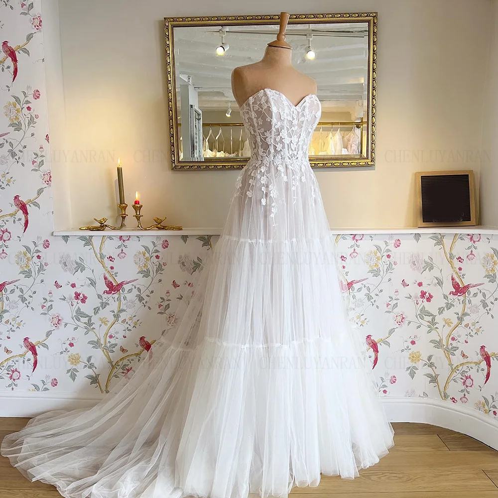 

Applique Lace Wedding Dresses Ivory A-Line Long Bride Dresses Tiered Sweep Train Tulle Dress For Women 2023 Robe De Mariée