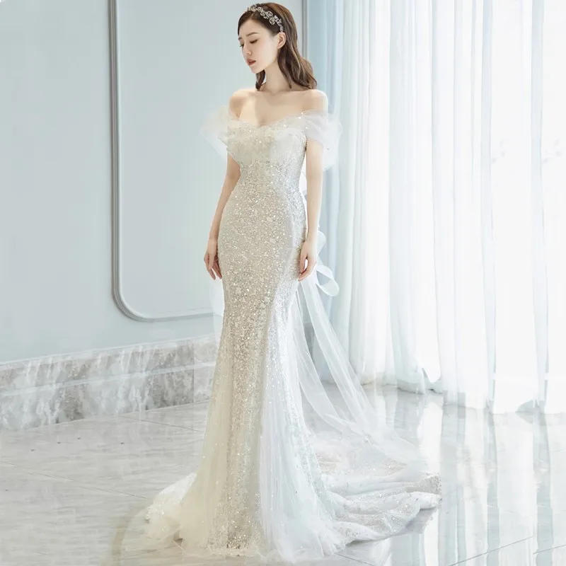 

Mermaid Light Bridal Gown Off Shoulder Illusion Trailing Wedding Dress Long Crystal White 2023 Sleeveless Robe De Mariée Brides
