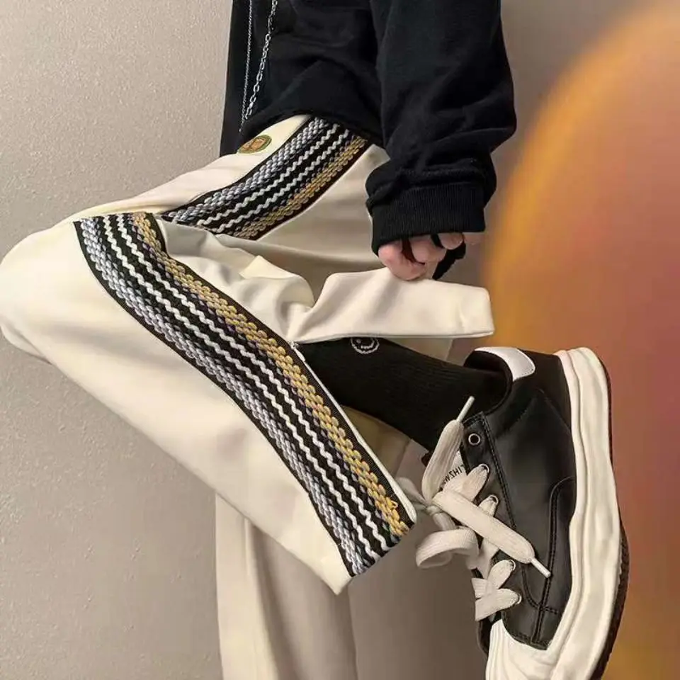 Trendy wide-leg pants for men and women, thickened splicing student sports pants, straight, loose, casual and versatile trousers
Trendy wide-leg pants for men and women, thickened splicing student sports pants, straight, loose, casual and versatile trousers