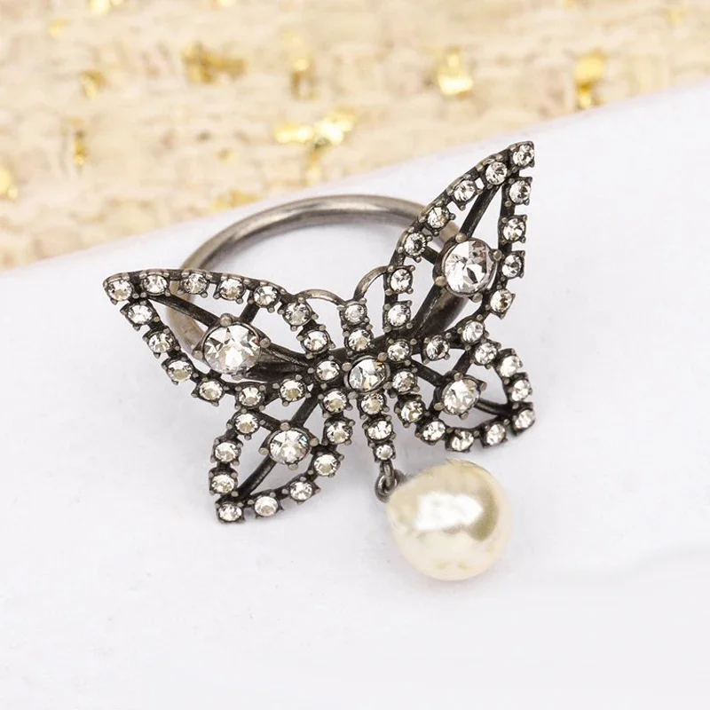 New Arrival Luxury Brand Fashion Butterfly Ring Smooth Brass Black Hollow Out Retro Pearl Style Women Party Jewelry High Quality
New Arrival Luxury Brand Fashion Butterfly Ring Smooth Brass Black Hollow Out Retro Pearl Style Women Party Jewelry High Quality