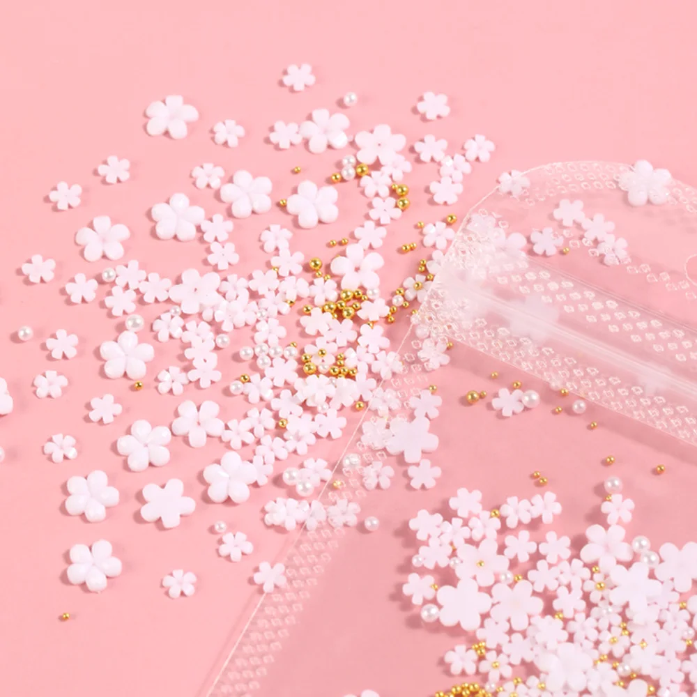 100Pcs Acrylic Nail Art Flower Seed Beads Charms Five Petals White Floret Mixed Gold/Silver Small Steel Ball Adorable Nail Decor
100Pcs Acrylic Nail Art Flower Seed Beads Charms Five Petals White Floret Mixed Gold/Silver Small Steel Ball Adorable Nail Decor
