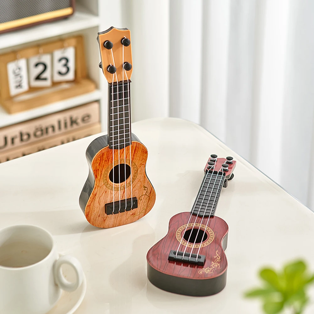 Miniature Ukulele Ornaments Folk Art Decoration Desktop Decorative Figurines Classic Home Deco rUnique Musical Instrument Crafts
Miniature Ukulele Ornaments Folk Art Decoration Desktop Decorative Figurines Classic Home Deco rUnique Musical Instrument Crafts