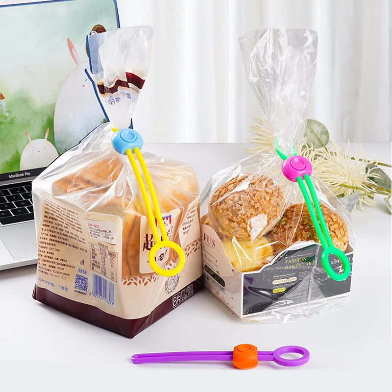 Sealing Clip Novel New Portable Strap Multi-Functional Kitchen Food Snack Plastic Bag Sealing Clip Creative Practical Cable Tie
Sealing Clip Novel New Portable Strap Multi-Functional Kitchen Food Snack Plastic Bag Sealing Clip Creative Practical Cable Tie