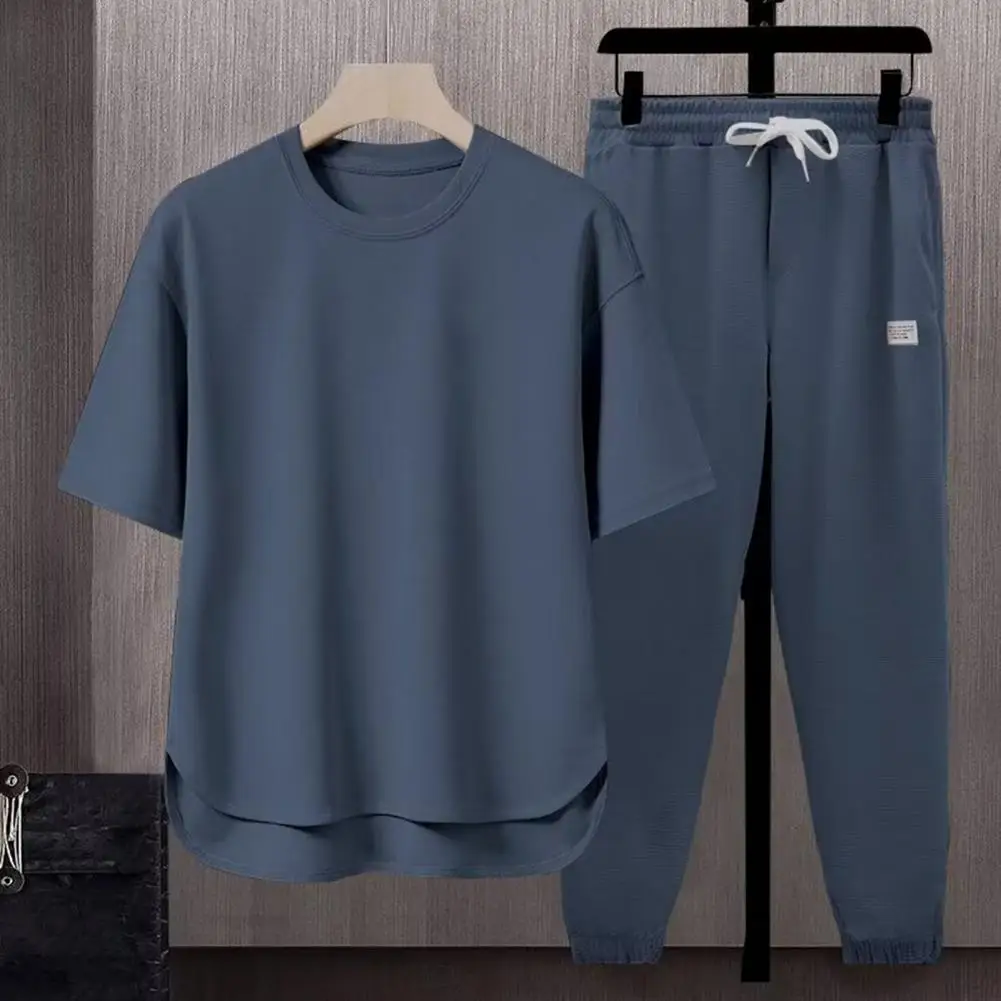 Short Sleeve Top Pants Set Men's Summer Sport Outfit Set O-neck Short Sleeve T-shirt Wide Leg Sweatpants with for Active
Short Sleeve Top Pants Set Men's Summer Sport Outfit Set O-neck Short Sleeve T-shirt Wide Leg Sweatpants with for Active