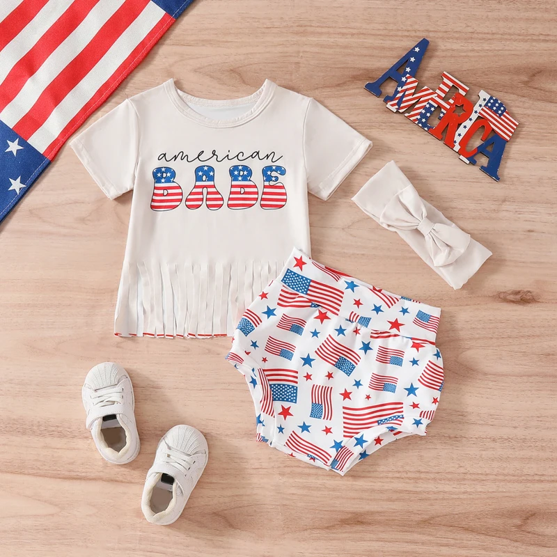 

Lioraitiin Baby Girls 4th of July Clothes Set Short Sleeve Letters Tasseled T-shirt with Stars Print Shorts and Hairband Set